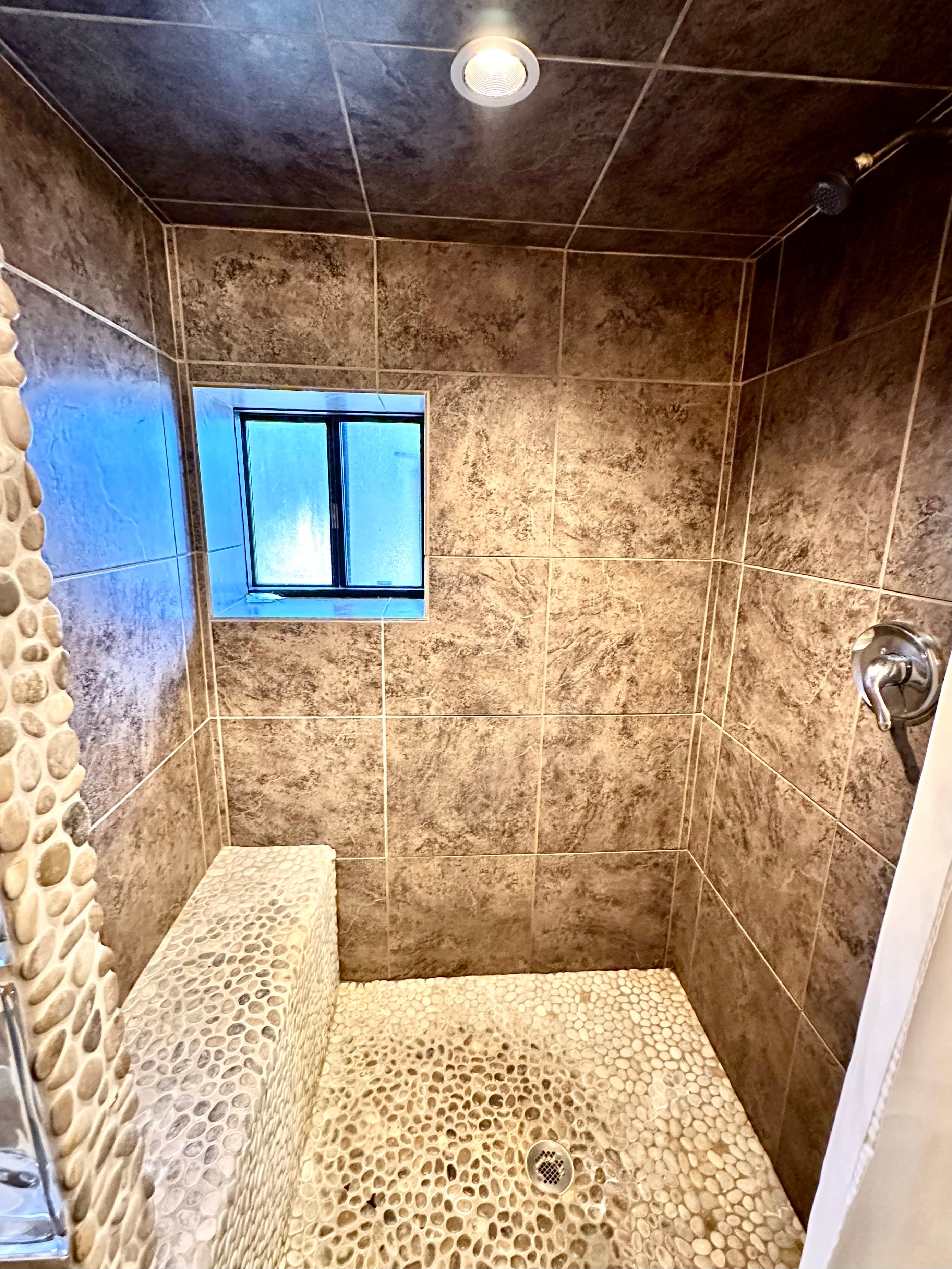 Large walk-in stone shower