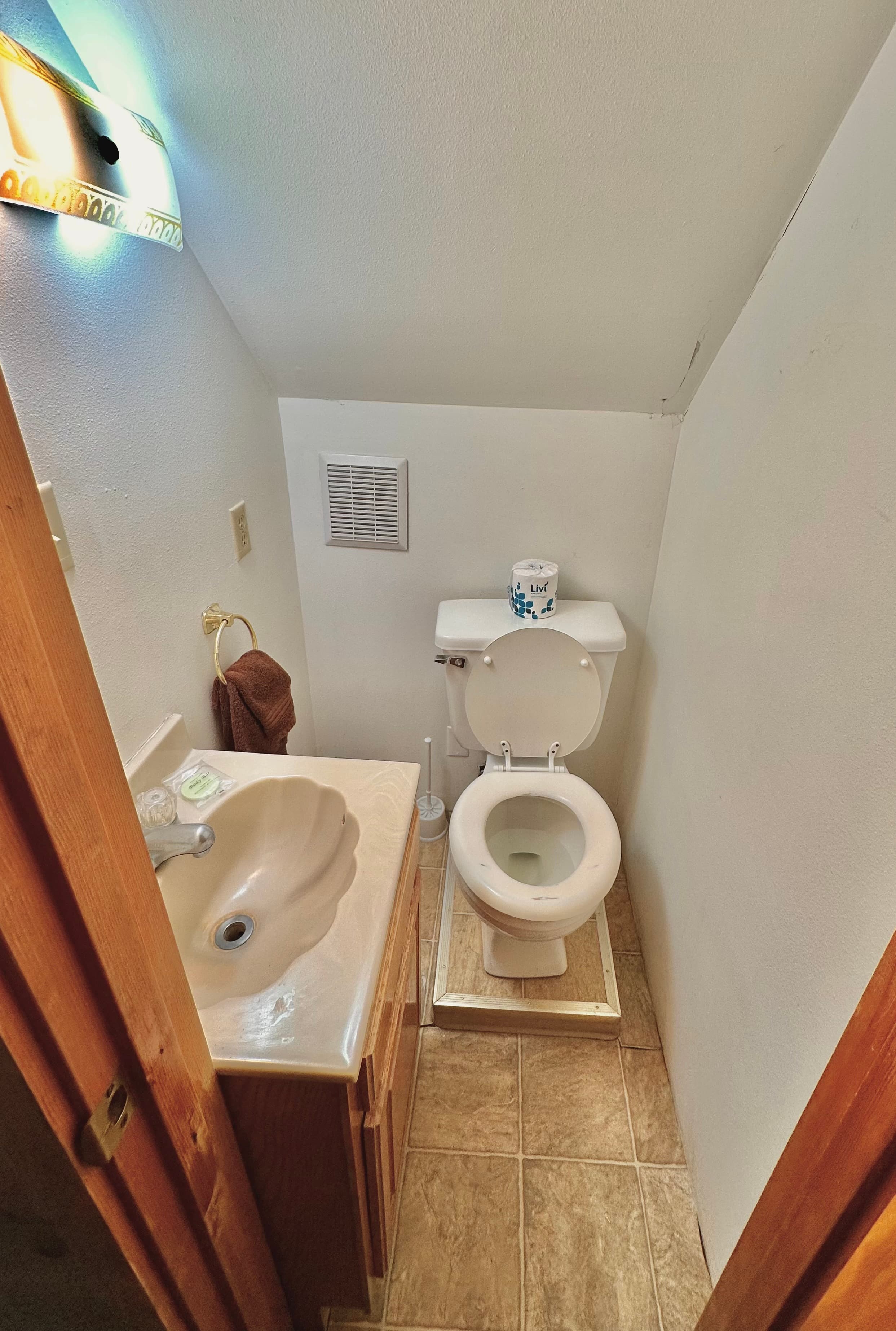 Tiny half bath upstairs loft
